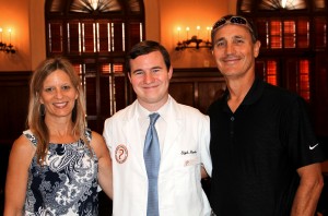 white coat student and parents
