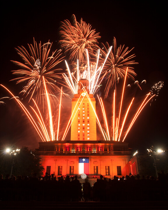 Night photo of commencement fireworks at UT Tower