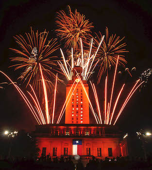 UT Tower with fireworks on commencement night