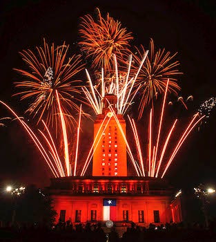 UT Tower with fireworks on commencement night