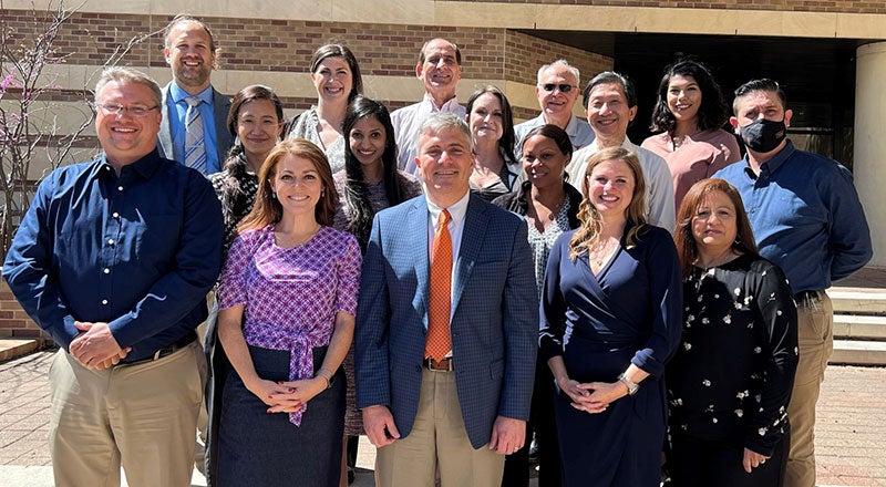 Pharmacotherapy division faculty and staff with Dean Poloyac