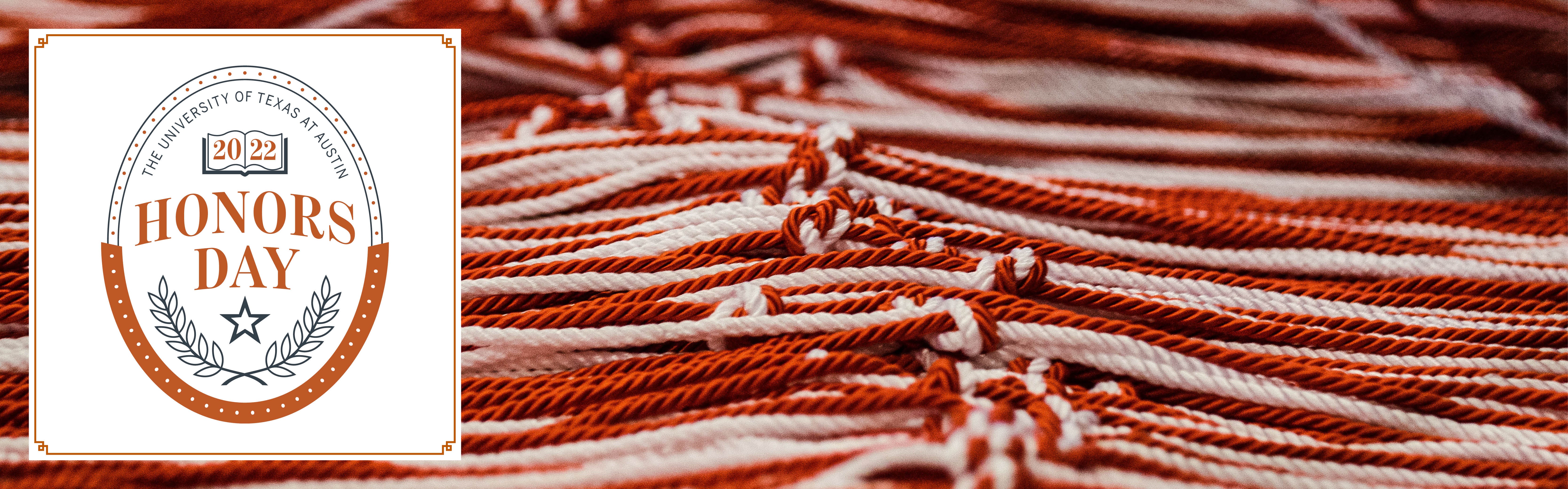 White and orange academic tassels.