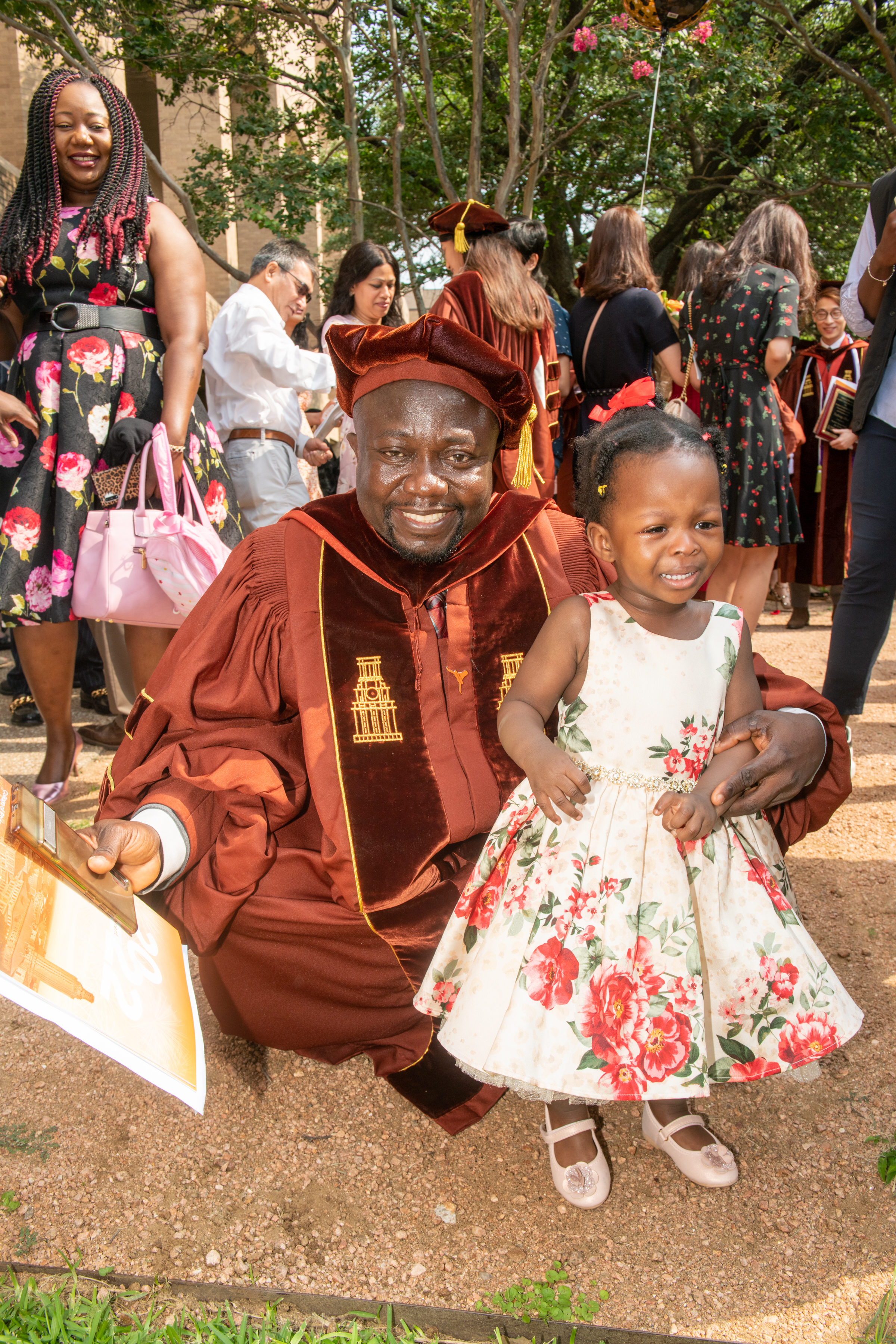 Father celebrating his graduation with his daughter.