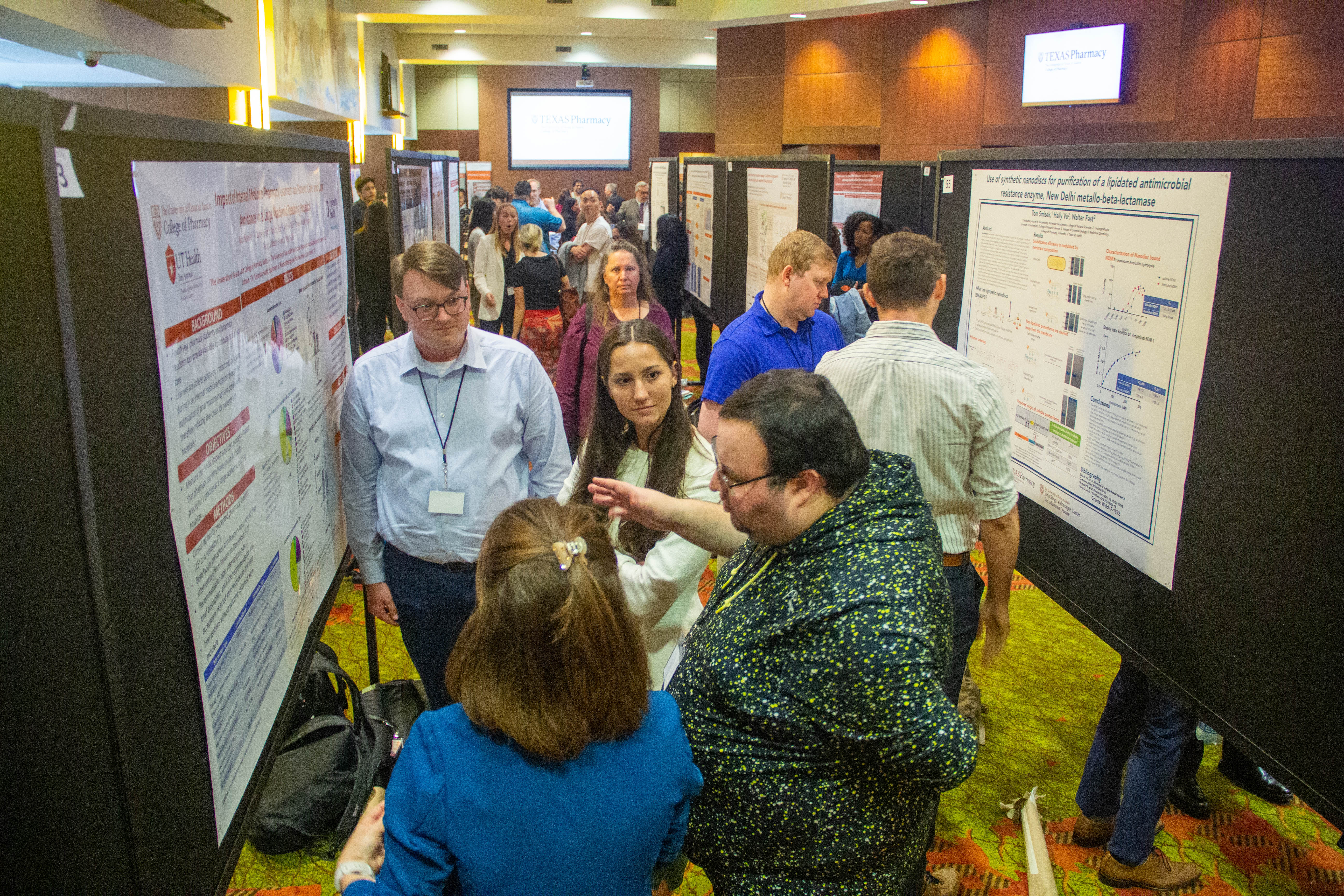 Group of attendees at the 2023 Research Excellence Day Pharmacy poster presentations.