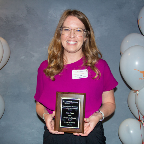 Dr. Laura Cannon with her award plaque.