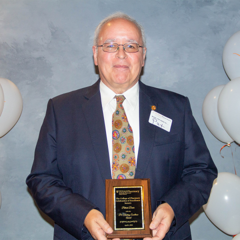 Dr. Patric Davis with his award plaque.