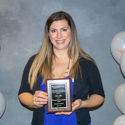 Dr. Sarah Kubes with her award plaque.