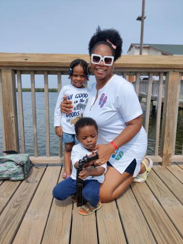 Student pharmacist Amaka Epoh with her two toddlers.