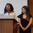 Two pharmacy students standing at podium
