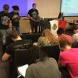students giving presentation at Spanish seminar