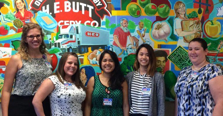 2016 to 2017 residency class group photo in front of mural