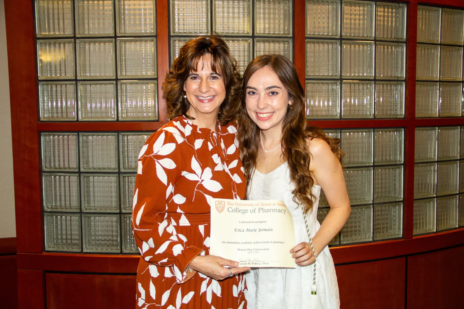 Associate Dean Acosta poses with one of this year’s three Distinguished Scholars, Erica Jermain.