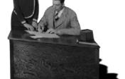 picture of desk from 1930 Texan News room
