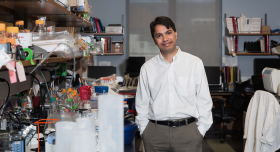 A man standing in a research laboratory.