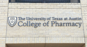 Signage for the UT College of Pharmacy.