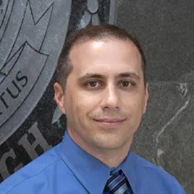A man smiling.