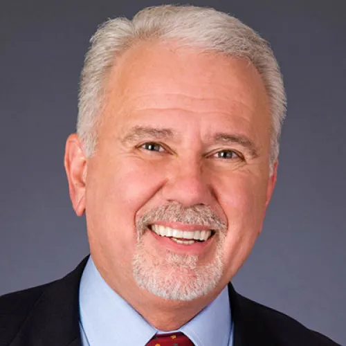 Dr. John Kozarich
