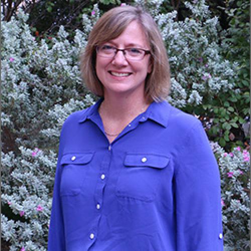 Laura Dupuis standing outside