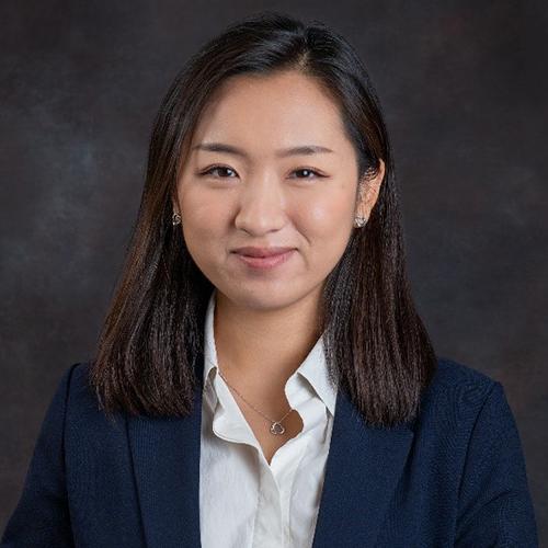 H. Jennifer Mueller smiling and wearing a blazer