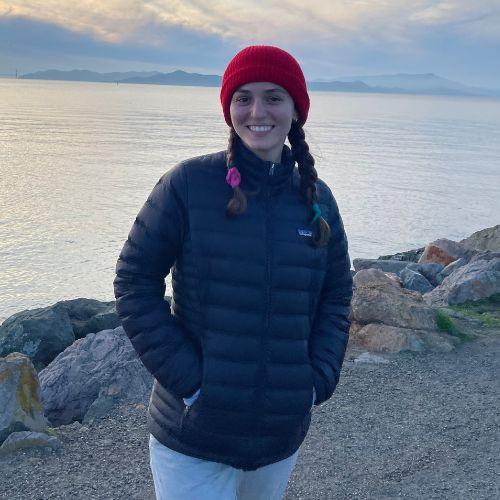 Sophia Khoury smiling in an outdoor setting