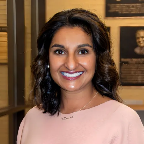 A woman smiling.