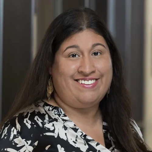 A woman smiling.