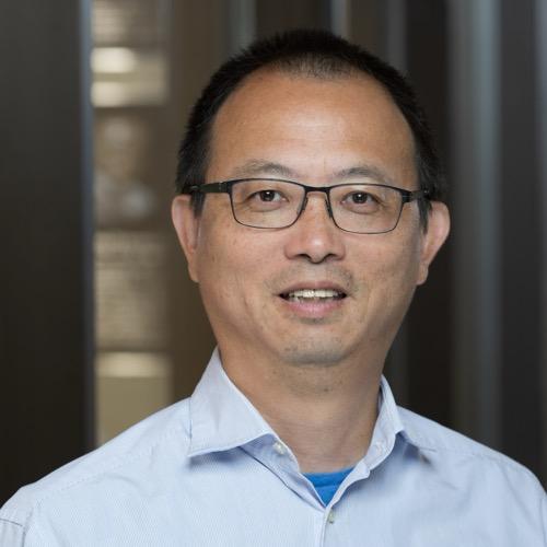 Dr. Feng Zhang smiling in an indoor setting