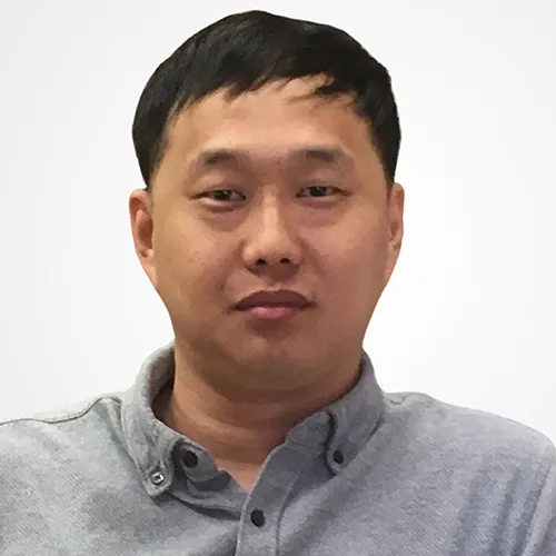 Kiyoung Kim wearing a grey shirt