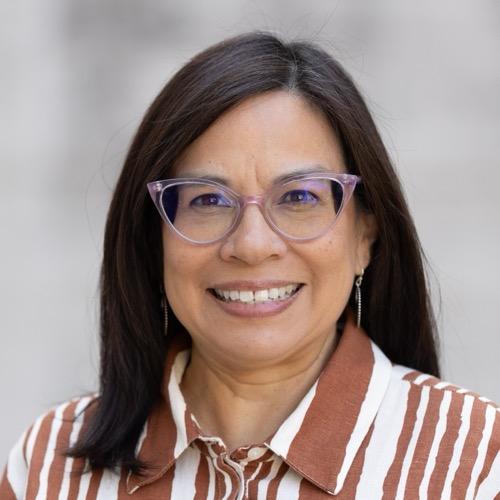 A woman smiling.