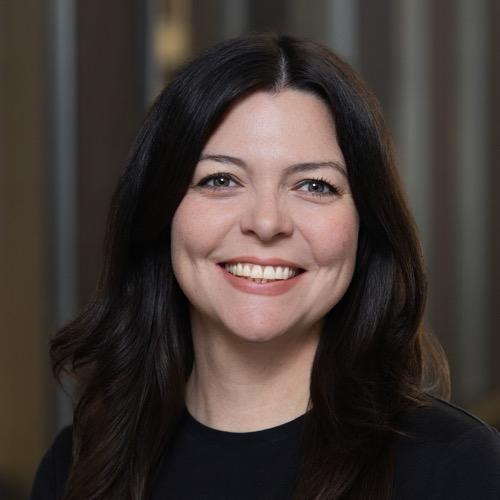 A woman smiling.