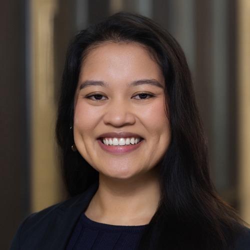 A woman smiling.
