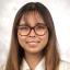 Beverly Fuerte smiling and wearing a white blouse