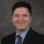 Michael McGovern wearing a suit