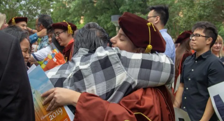 2019 commencement hug