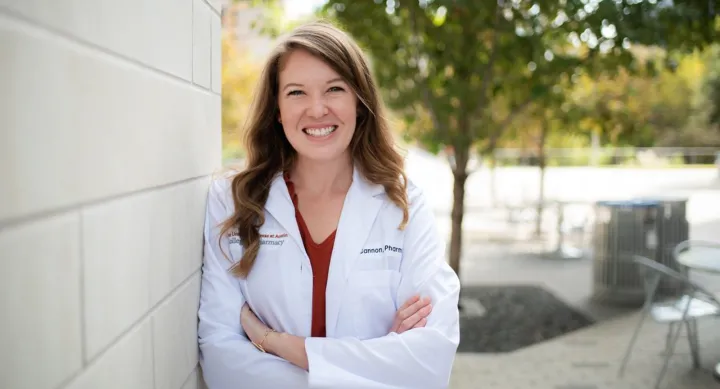 Dr. Laura Cannon standing outside and leaning against a wall