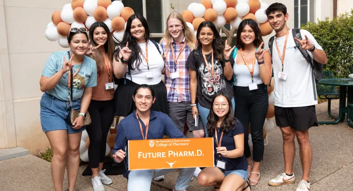 A group of pharmacy students pose together during the Class of 2026 Block party celebration.