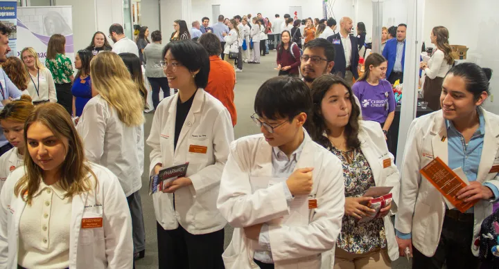 Pharm.D. students and employers interacting at career fair