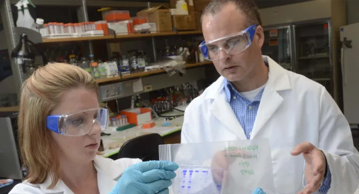 Two scientists working in the lab.