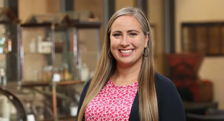 A woman smiling.