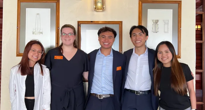 Student pharmacists from UTCOP stand together at a national conference.