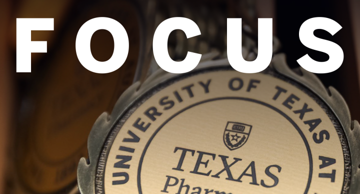 The top half of a medal with the text "FOCUS: The Magazine of The University of Texas at Austin College of Pharmacy."