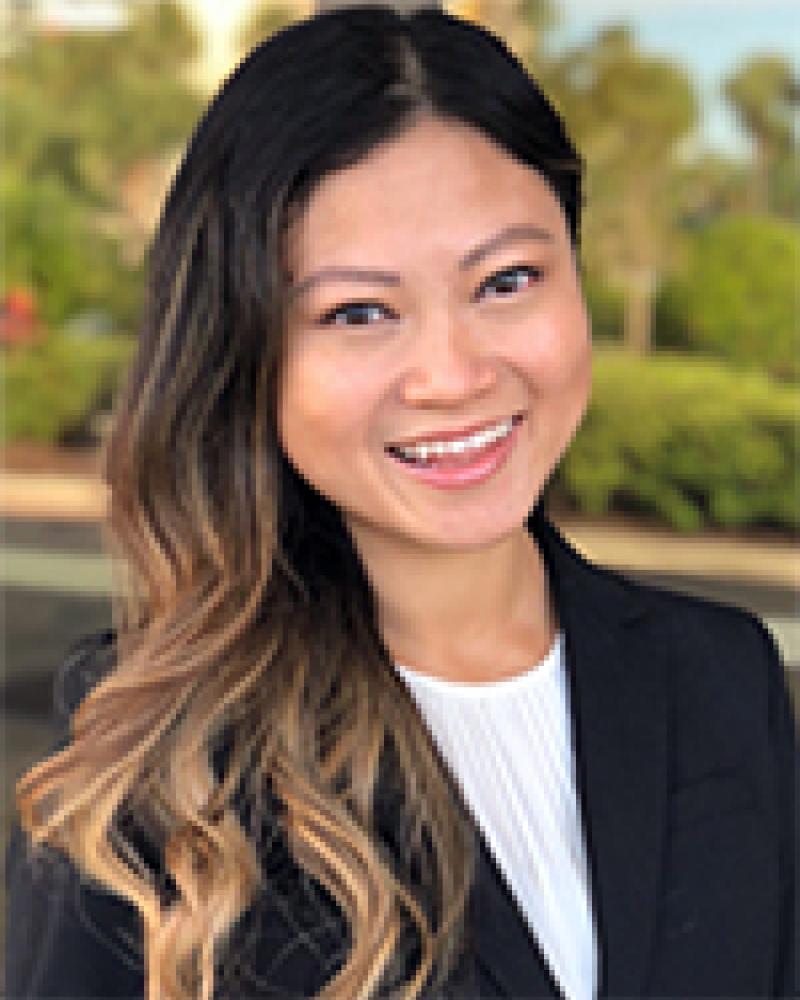 Dr. Cindy Wu smiling in an outdoor setting