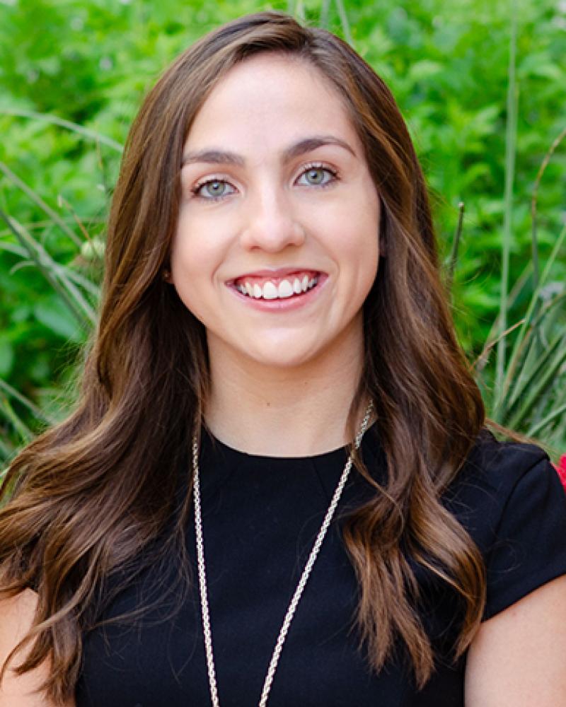 Jillian Contreras smiling in an outdoor setting