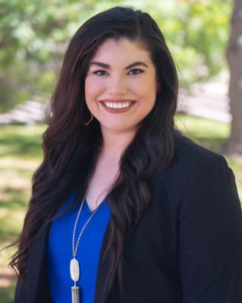 Sarah Bermudez smiling in an outdoor setting