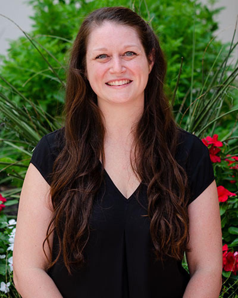 Dr. Kyllie Ryan-Hummel smiling in an outdoor setting