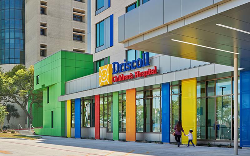 Driscoll Children's Hospital entrance with columns painted with bright, primary colors