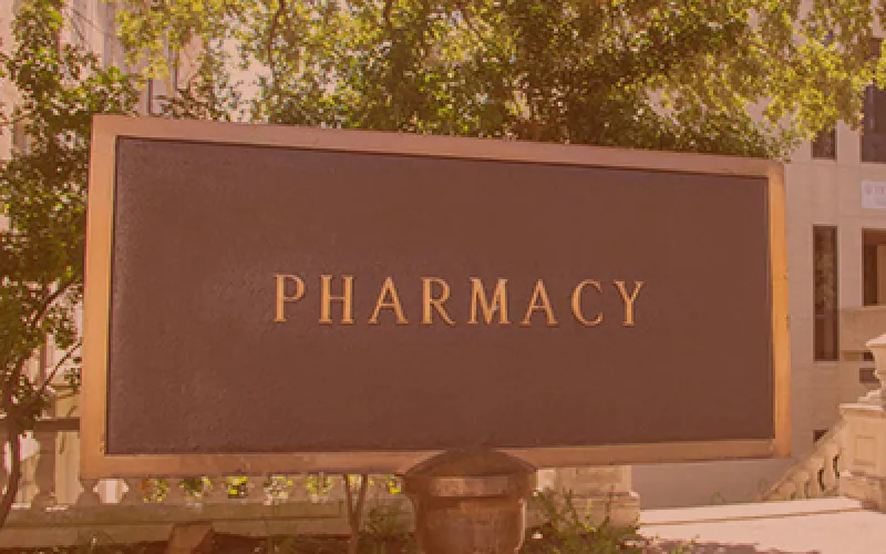 Pharmacy sign outside College of Pharmacy building