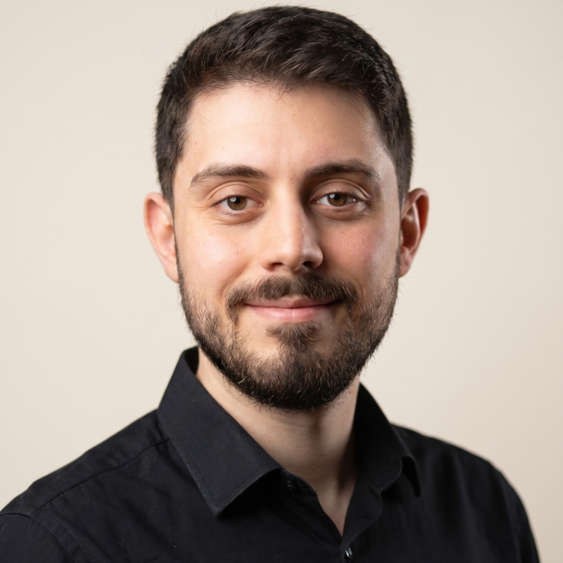Photo of man with short hair and a beard 