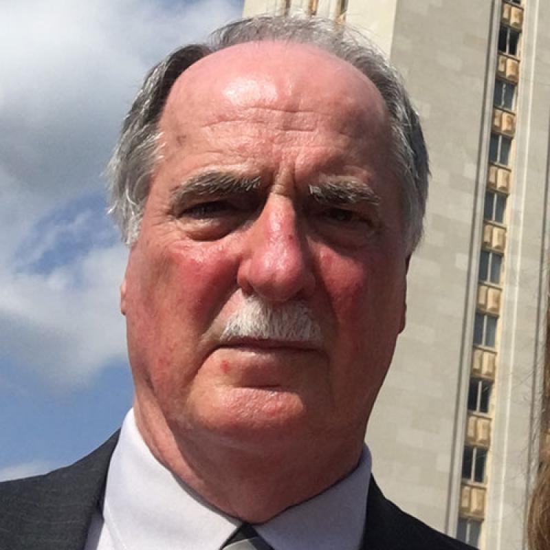 George Polansky in front of the UT Tower